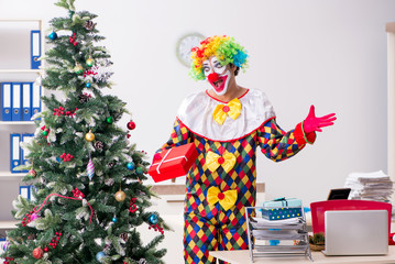 Funny clown in Christmas celebration concept 
