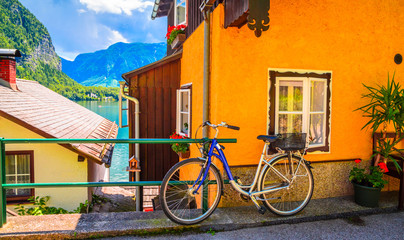 Austrian Alpine house with bicycle in Hallstatt village, Austrian Alps,  Salzkammergut, Austria, Europe