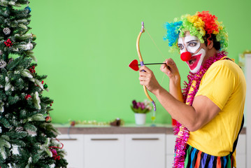 Funny clown in Christmas celebration concept 