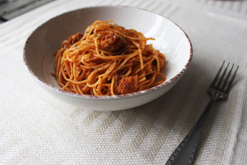 tasty vegan pasta in tomato sauce with soya 