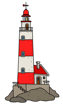 The old red and white stone lighthouse