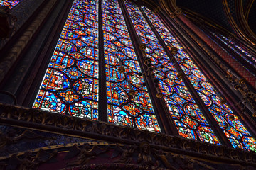 Interior and stained glass windows of the magnificent gothic chapel of Sainte Chappelle in Paris