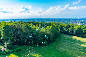 Blue and White Wedding balloons flying to the sky in Iserlohn City