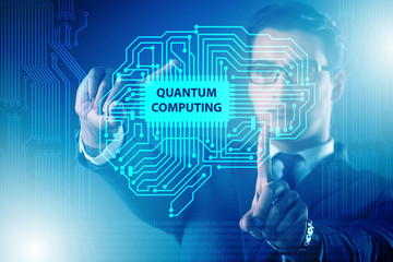 Businessman pressing virtual button in quantum computing concept