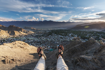 a happy man enjoying beautiful aerial landscape view point in Leh city, in Ladakh region, India....