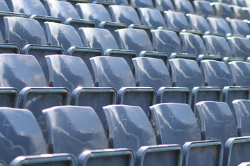 rows of empty seats in stadium
