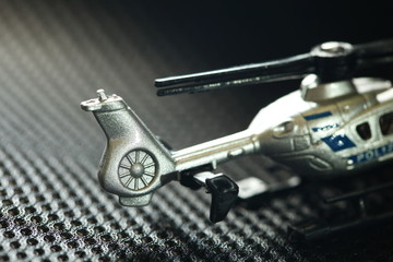 Miniature helicopter model scene.