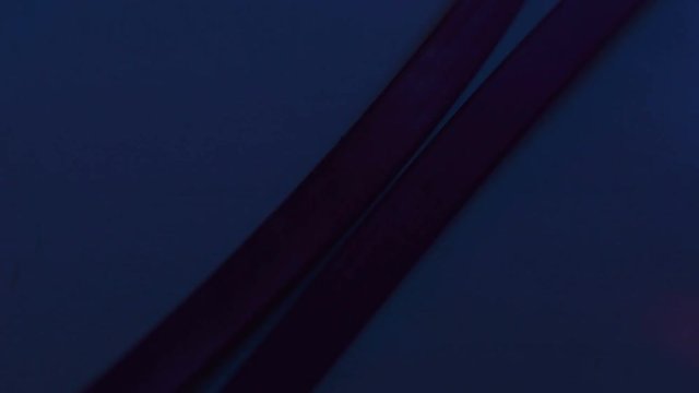 Few cables on blinking red-blue background, alert signal to security company