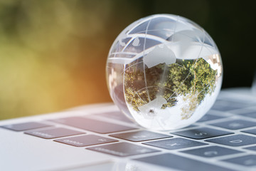 Online E-Learning education by Technology concept : Australia Educational knowledge learning study abroad international Ideas. Glass earth globe on laptop keyboard, Studies from anywhere anytime