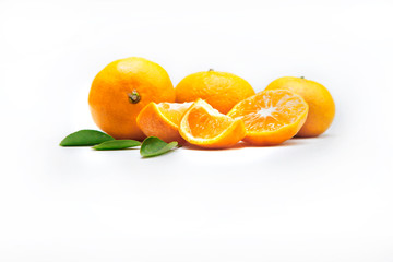 fresh oranges  with leaves on white isolated background