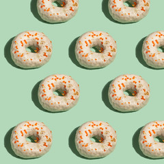 Carrot Cake Doughnuts on Mint Background