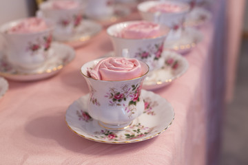 China tea cup with rose napkin