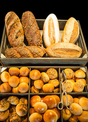 Variety of french bread with sesame in black background