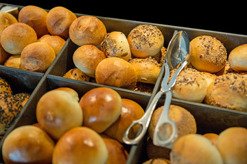 Variety of french bread with sesame in black background