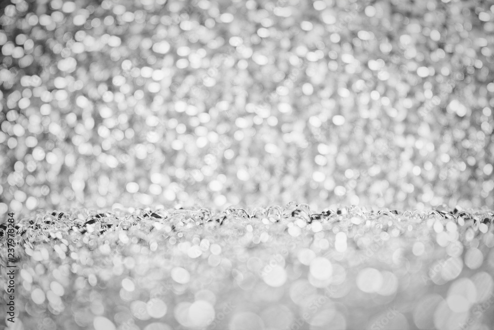 Poster abstract silver white lights glister bokeh background concept copy space shiny blurred lights ,chris