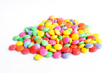 a pile of colorful chocolate coated candy Isolated on white backgrounds
