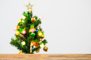 Christmas background. Wooden table with Christmas tree. Selective focus