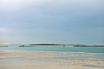 Coast of the Dead Sea in Israel on a cloudy day