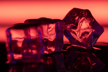Three red ice cubes