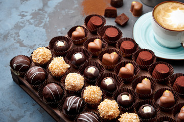 Chocolate handmade candies, pralines and truffles in assortment. 