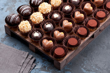 Chocolate handmade candies, pralines and truffles in assortment. 