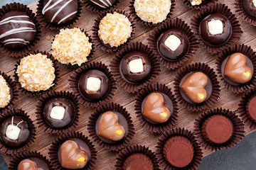 Chocolate handmade candies, pralines and truffles in assortment. 