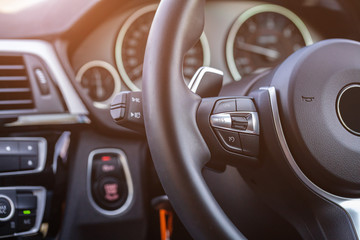 close up of steering wheel, modern car interior details