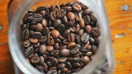 Fototapeta premium coffee beans in a cup