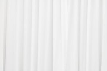 White fabric texture background. Crumpled of curtains material.