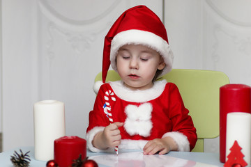 Little kid are writing letter to Santa