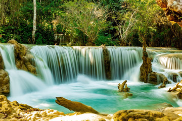 Fototapeta na wymiar Threshold Kuang Si Waterfall. Laos. Luang Prabang