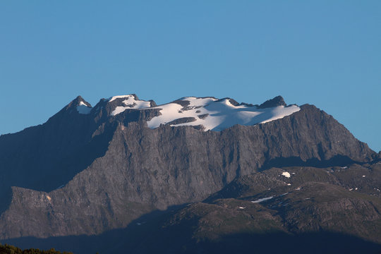 Snow-covered mountain tops. Orsta, Norway