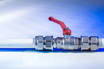 Plumbing with leak of water. Broken water pipes.