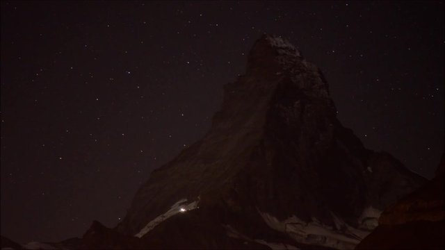 Sunrise on Cervin (Matterhorn) with alpinists climbing