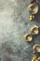 White wine on the stone background, close up