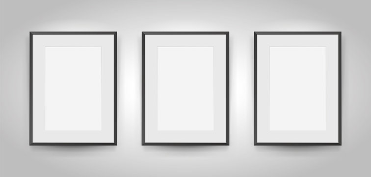 Three realistic empty rectangular black frames with passepartout on gray background, border for your creative project, mock-up sample, picture on the wall, vector design object