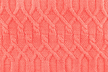 Knitted texture in Living Coral color of 2019.