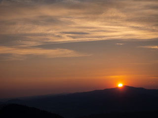 Fototapeta na wymiar Western Beskids at Sunset. Gorce Mountains and Mount Luban. View from Mount Jarmutka, Pieniny, Poland.