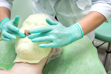 Facial Skin Treatment. Alginate Mask On Female Face