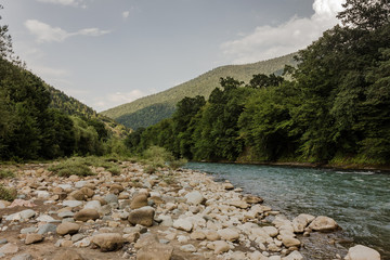 River mountain origin clean water summer.