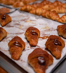 Chocolate croissant on the plate in the bakery&coffee shop