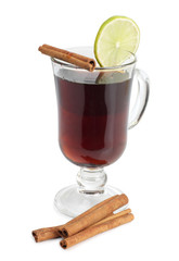 Glass cup with mulled wine on white background