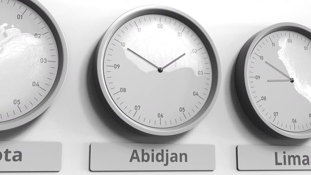 Focus on the clock showing Abidjan, Ivory Coast time. Conceptual 3D animation