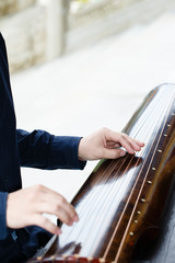 Local close-up of Chinese traditional instrument Guqin - 238007679