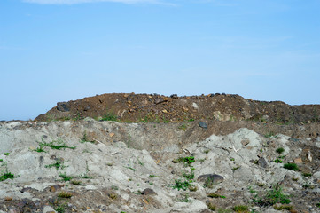Desert landscape after mining activities. The destruction of forests due to the overburden dump pit