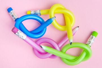 A lot of Flexible color pencil. Bent pencils. Flexible business concept.