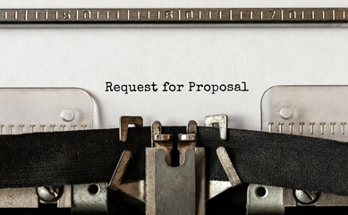 Text Request for Proposal typed on retro typewriter