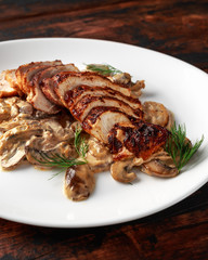 Grilled slices Chicken Breast with Creamy Mushroom Sauce. healthy food