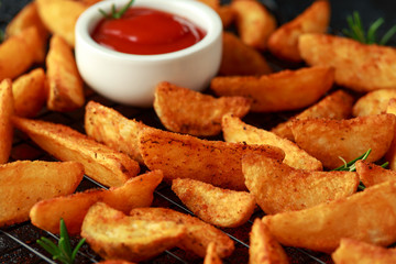 Paprika potato wedges fries chips, with ketchup and thyme