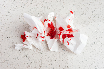 bloody tissue on a white background